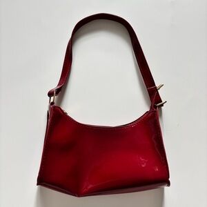 burgundy shoulder bag with gold zipper